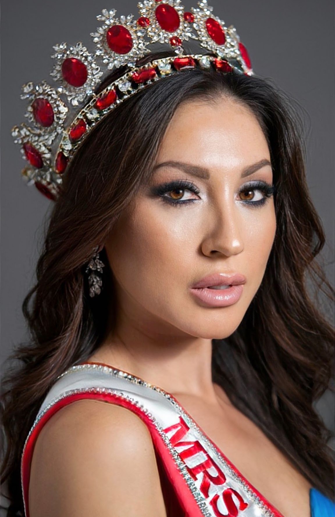 Olesya Leuenberger, founder of the Ladies Culture Club Switzerland, wearing her Mrs Switzerland World crown and sash